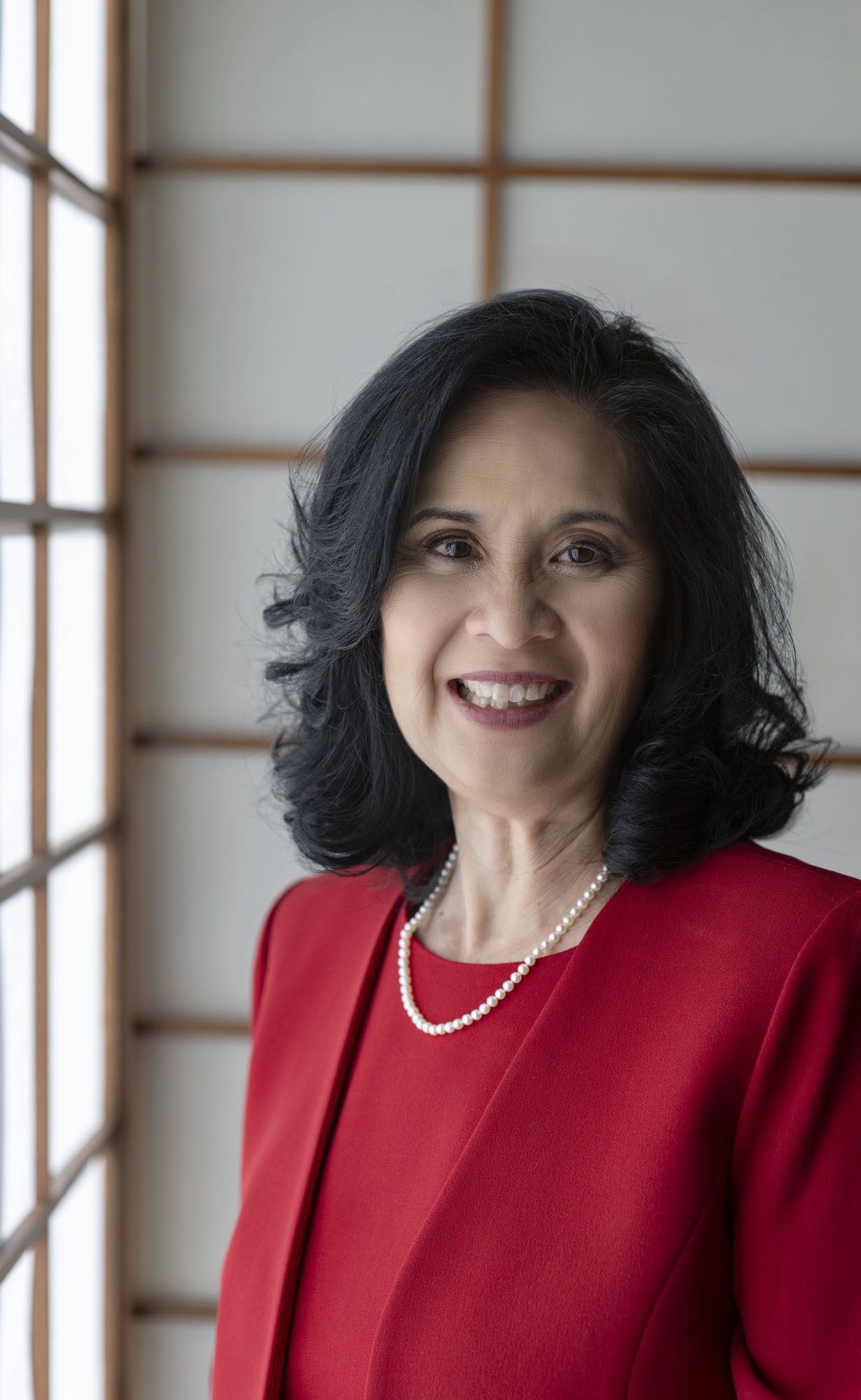 2026 Featured Speaker Debra Kawahara, Ph.D. 2026 Featured Speaker Debra Kawahara, Ph.D. in red suit